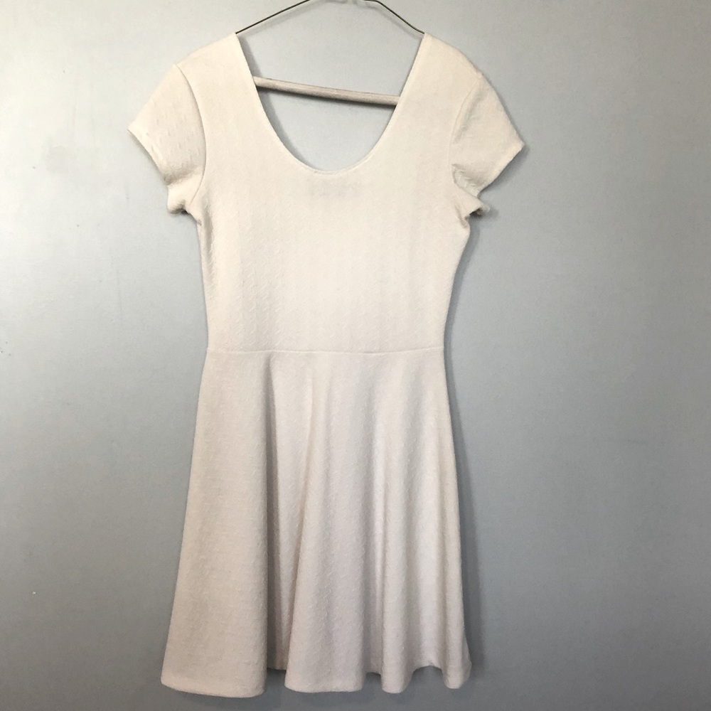 White/textured babydoll top dress- flowy at bottom